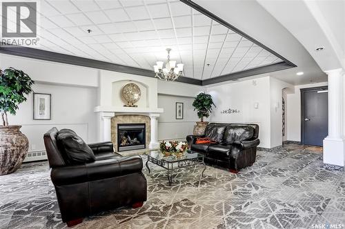 213 928 Heritage View, Saskatoon, SK - Indoor Photo Showing Living Room With Fireplace