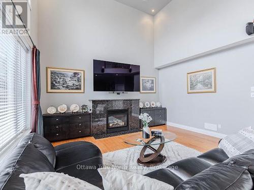 507 Kochar Drive, Ottawa, ON - Indoor Photo Showing Living Room With Fireplace