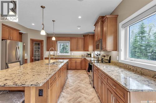 #26 Estates Drive, Elk Ridge, SK - Indoor Photo Showing Kitchen With Stainless Steel Kitchen With Double Sink With Upgraded Kitchen