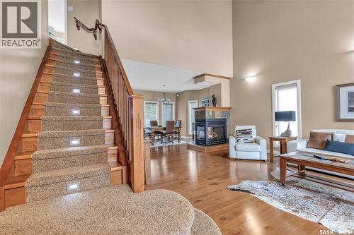 #26 Estates Drive, Elk Ridge, SK - Indoor With Fireplace