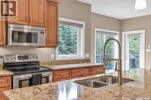 #26 Estates Drive, Elk Ridge, SK - Indoor Photo Showing Kitchen With Stainless Steel Kitchen With Double Sink
