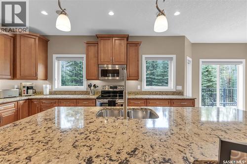 #26 Estates Drive, Elk Ridge, SK - Indoor Photo Showing Kitchen With Stainless Steel Kitchen With Double Sink