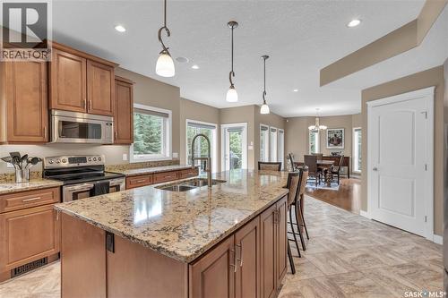 #26 Estates Drive, Elk Ridge, SK - Indoor Photo Showing Kitchen With Double Sink With Upgraded Kitchen