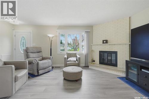 2922 21St Street W, Saskatoon, SK - Indoor Photo Showing Living Room With Fireplace