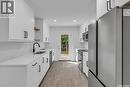 1428 E Avenue N, Saskatoon, SK  - Indoor Photo Showing Kitchen With Double Sink 