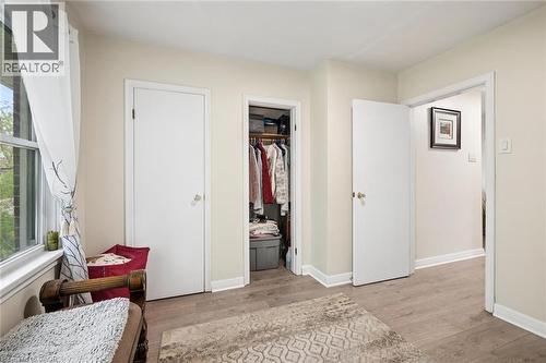 Interior space featuring light wood-finish flooring, neutral wall paint, and white trim - 786 S Stirling Avenue S, Kitchener, ON - Indoor
