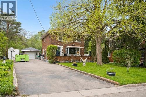Brick exterior featuring stone window sills and a bay window - 786 S Stirling Avenue S, Kitchener, ON - Outdoor