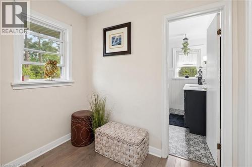 Hardwood-finish flooring in a neutral color palette - 786 S Stirling Avenue S, Kitchener, ON - Indoor Photo Showing Other Room
