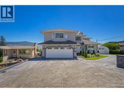 Generous-sized driveway; attached two car garage - 