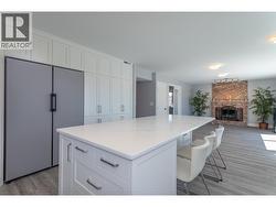 Open-concept layout with kitchen and family room - 