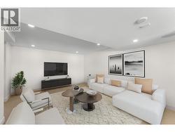 Photo has been virtually staged. Additional family room or movie room next to bar. - 