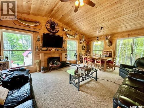 10 Hillview Drive, Tobin Lake, SK - Indoor Photo Showing Living Room With Fireplace