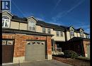 Brick and siding exterior featuring dormer windows with arched upper panes - 37 Northcliffe Crescent, Cambridge, ON  - Outdoor 