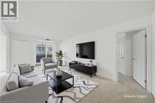 Virtually Staged - 416 Limeridge Road E Unit# 303, Hamilton, ON - Indoor Photo Showing Living Room