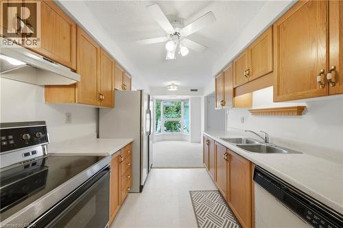 416 Limeridge Road E Unit# 303, Hamilton, ON - Indoor Photo Showing Kitchen With Double Sink
