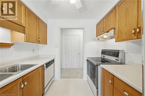 416 Limeridge Road E Unit# 303, Hamilton, ON - Indoor Photo Showing Kitchen With Double Sink