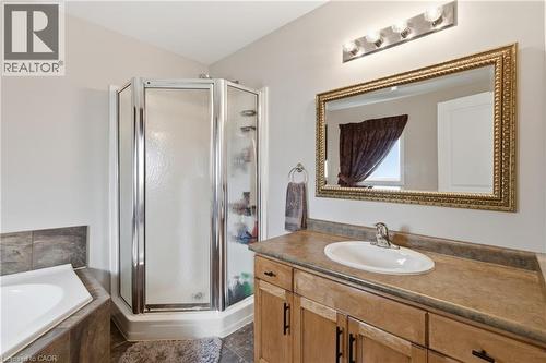 Corner shower enclosure with clear glass panels - 84 Duncairn Crescent, Hamilton, ON - Indoor Photo Showing Bathroom