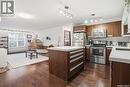 107 130 Phelps Way, Saskatoon, SK  - Indoor Photo Showing Kitchen With Stainless Steel Kitchen 