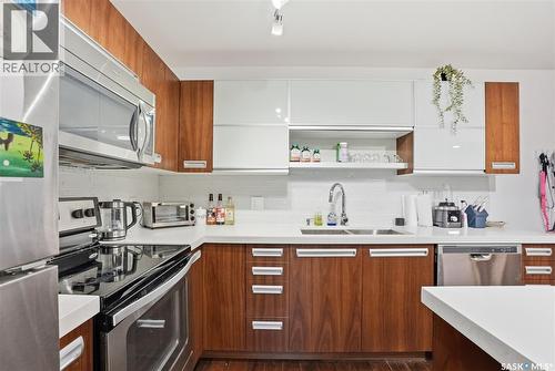 107 130 Phelps Way, Saskatoon, SK - Indoor Photo Showing Kitchen With Stainless Steel Kitchen With Upgraded Kitchen