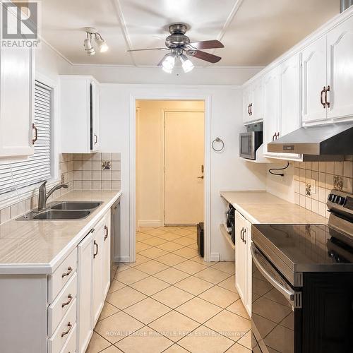 3427 Martins Pine Crescent, Mississauga, ON - Indoor Photo Showing Kitchen With Double Sink