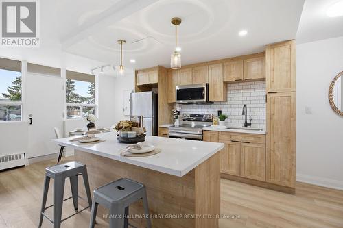 101 - 1950 Kennedy Road, Toronto, ON - Indoor Photo Showing Kitchen