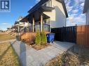 119 Reddekopp Crescent, Warman, SK  - Outdoor With Deck Patio Veranda With Exterior 