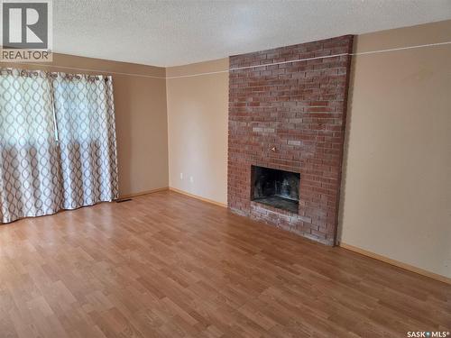 1101 109Th Avenue, Tisdale, SK - Indoor Photo Showing Living Room With Fireplace