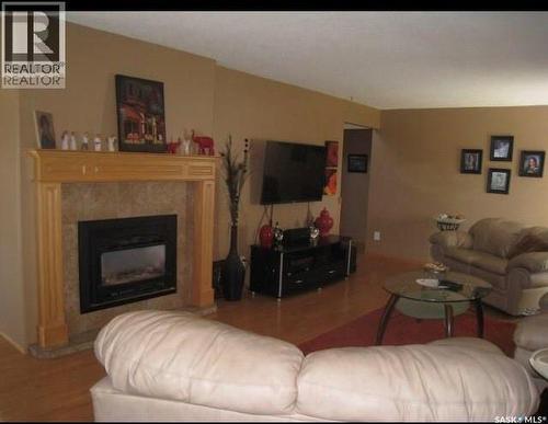 1101 109Th Avenue, Tisdale, SK - Indoor Photo Showing Living Room With Fireplace