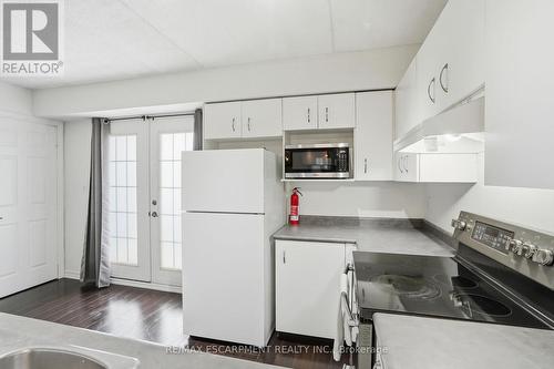 216 - 1451 Walkers Line, Burlington, ON - Indoor Photo Showing Kitchen