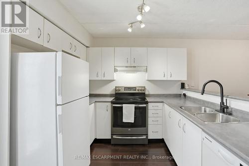 216 - 1451 Walkers Line, Burlington, ON - Indoor Photo Showing Kitchen With Double Sink