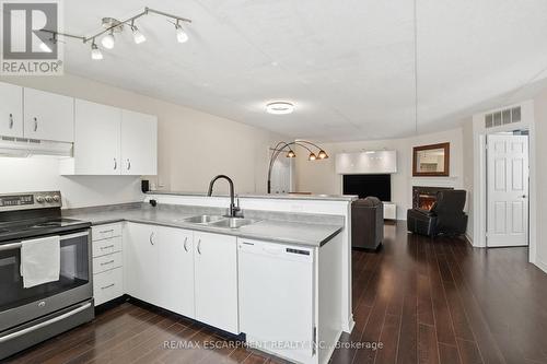 216 - 1451 Walkers Line, Burlington, ON - Indoor Photo Showing Kitchen With Double Sink