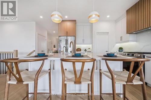 14 Faith Drive, Mapleton, ON - Indoor Photo Showing Kitchen With Upgraded Kitchen