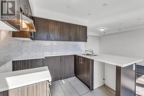 17 - 185 Veterans Drive, Brampton, ON - Indoor Photo Showing Kitchen With Double Sink