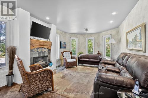 26 Edgecombe Terrace, Springwater, ON - Indoor Photo Showing Living Room With Fireplace
