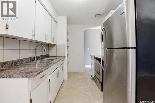 4174 Castle Road, Regina, SK - Indoor Photo Showing Kitchen With Double Sink