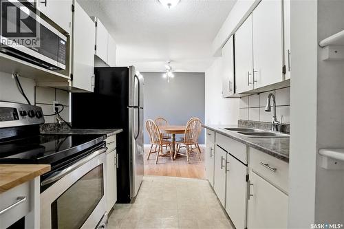 4174 Castle Road, Regina, SK - Indoor Photo Showing Kitchen With Double Sink
