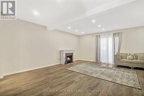 494 Sandhamn Private, Ottawa, ON - Indoor Photo Showing Living Room With Fireplace
