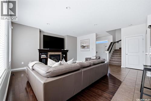 141 Oxbow Crescent, Regina, SK - Indoor Photo Showing Other Room With Fireplace