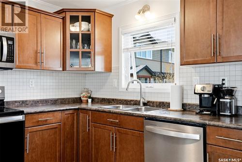 610 110 Shillington Crescent, Saskatoon, SK - Indoor Photo Showing Kitchen With Double Sink