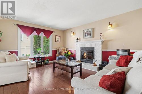 277 Mceachern Crescent, Ottawa, ON - Indoor Photo Showing Living Room With Fireplace