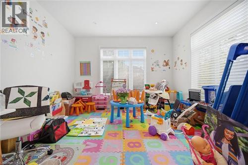 Room featuring multiple windows with blinds, white walls, and recessed lighting - 58 Doon Creek Street, Kitchener, ON - Indoor Photo Showing Other Room
