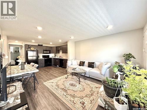 503 110 Akhtar Bend, Saskatoon, SK - Indoor Photo Showing Living Room