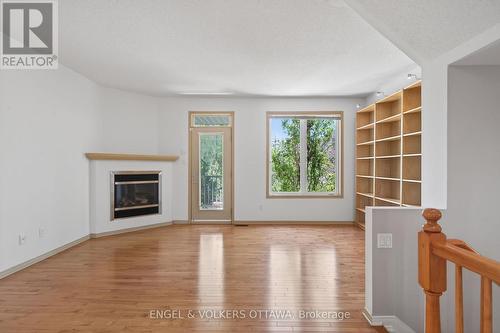 27 Briarway Private, Ottawa, ON - Indoor With Fireplace