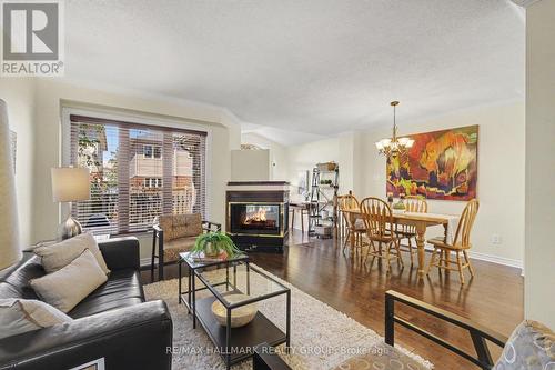 176 Hunterswood Crescent, Ottawa, ON - Indoor Photo Showing Living Room With Fireplace