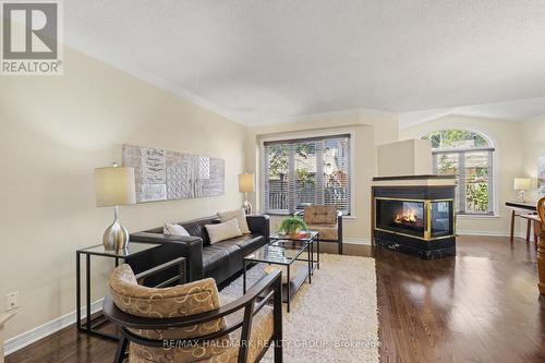 176 Hunterswood Crescent, Ottawa, ON - Indoor Photo Showing Living Room With Fireplace