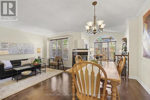 176 Hunterswood Crescent, Ottawa, ON - Indoor Photo Showing Dining Room With Fireplace