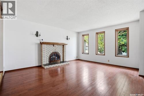 43 Springstein Avenue, Regina, SK - Indoor Photo Showing Living Room With Fireplace