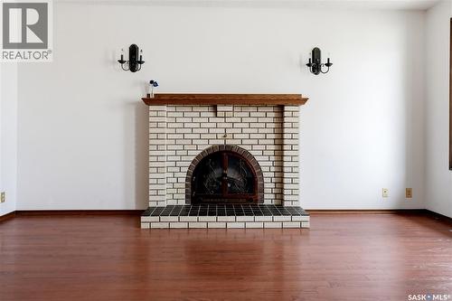 43 Springstein Avenue, Regina, SK - Indoor Photo Showing Living Room With Fireplace