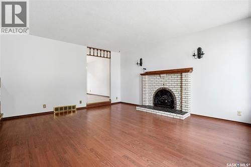 43 Springstein Avenue, Regina, SK - Indoor Photo Showing Living Room With Fireplace