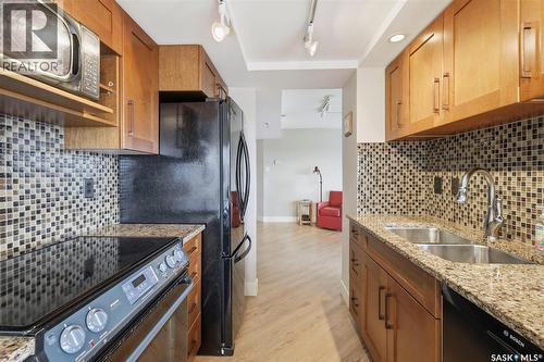 1670 424 Spadina Crescent E, Saskatoon, SK - Indoor Photo Showing Kitchen With Double Sink
